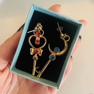 set of beautiful sailor moon and heart earrings.